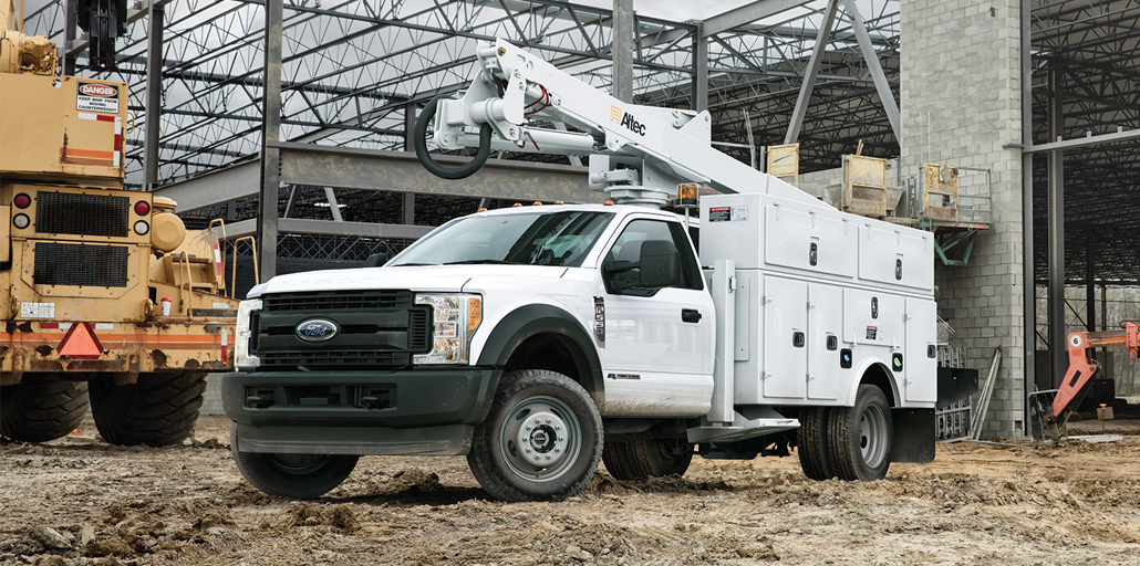 Ford Super Duty Chassis Utility vehicle helping assist others on the job