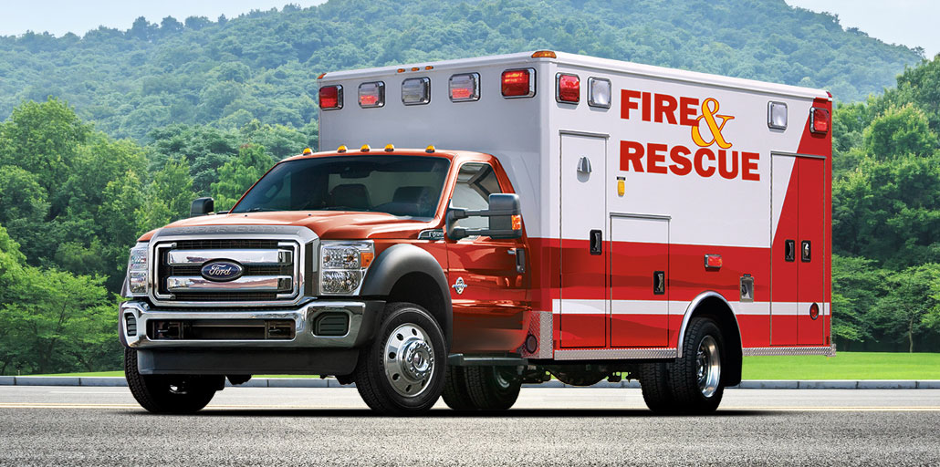 Ford Super Duty Chassis ambulance driving down the road